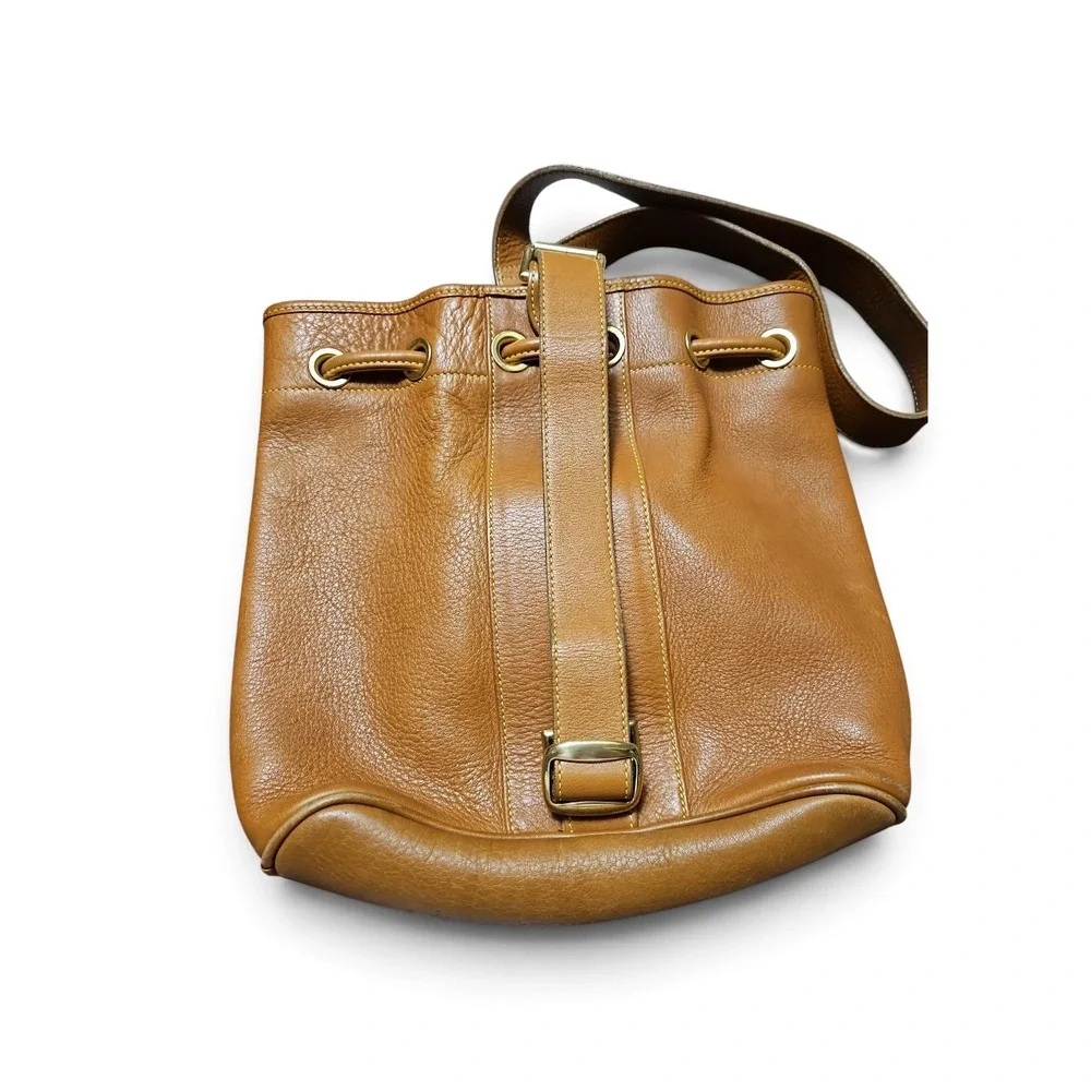 Vintage Dooney & Bourke All Weather Leather Drawstring Bucket Bag Tan Ginger